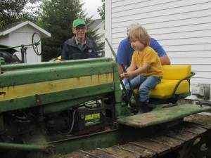 boy on bulldozer